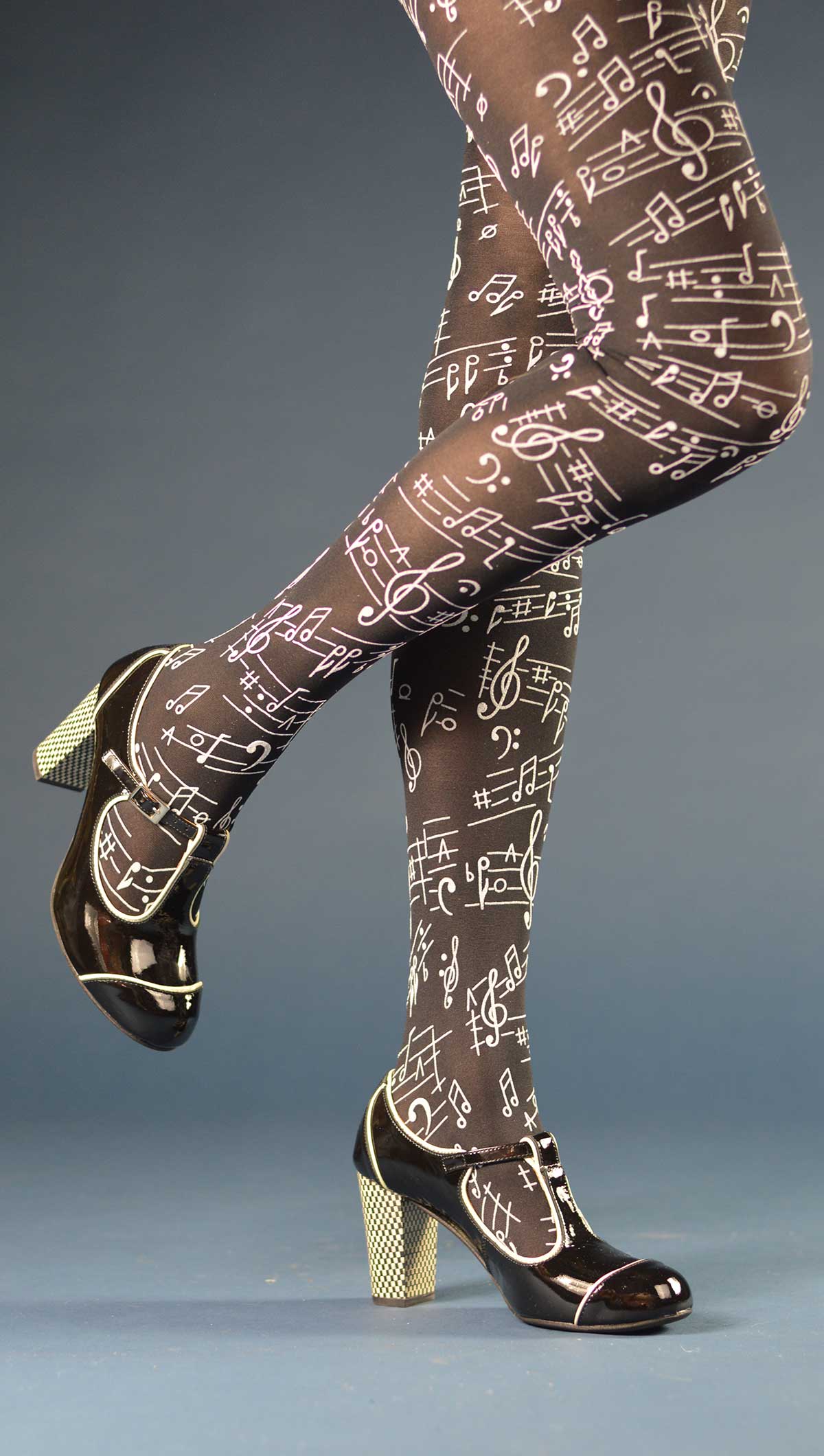 https://www.modshoes.co.uk/wp-content/uploads/2023/11/modshoes-womens-tights-PM-b-and-w-music-notes-01.jpg